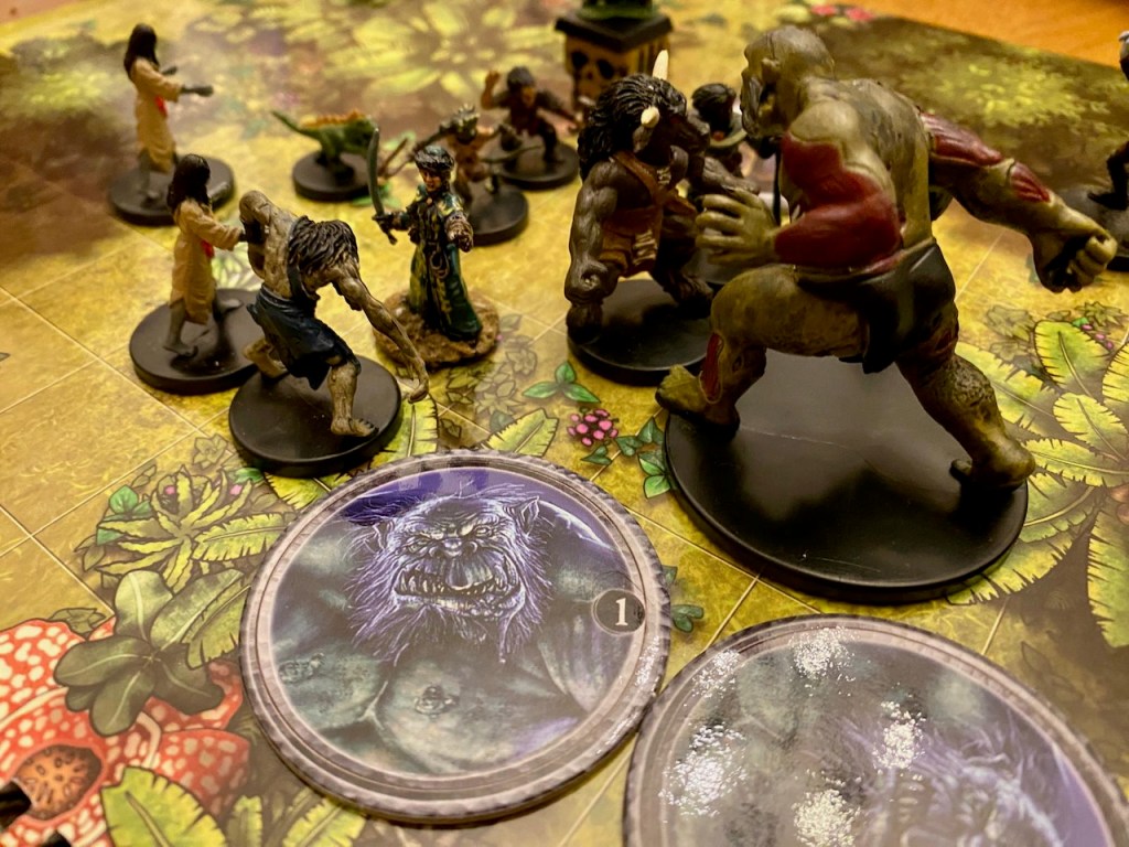 PC minis, ogre-zombie mini & ogre-zombie tokens on jungle battle map