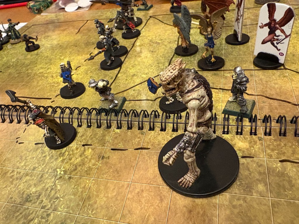 Giant skeleton, regular skeletons, harpy minis